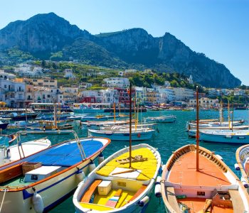 Capri, Italy - April 22, 2007: Boat for tourists in the Marina Grande harbor