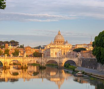 View of the dome of St. Peter's Cathedral in the Vatican at dawn. Rome. Italy.