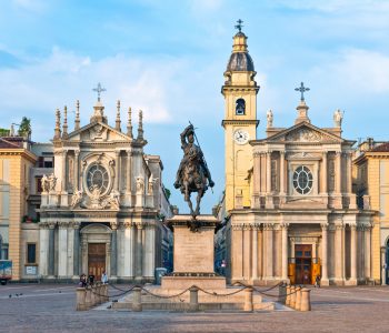 Turin, Italy -  June 25, 2010: People in San Carlo square at sunset