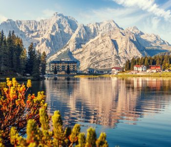 Beautiful Summer sunny landscape. Wonderful view on Misurina Alpine lake in morning. National Park Tre Cime di Lavaredo, Auronzo, Dolomites Alps, South Tyrol, Italy, Europe. Nature background